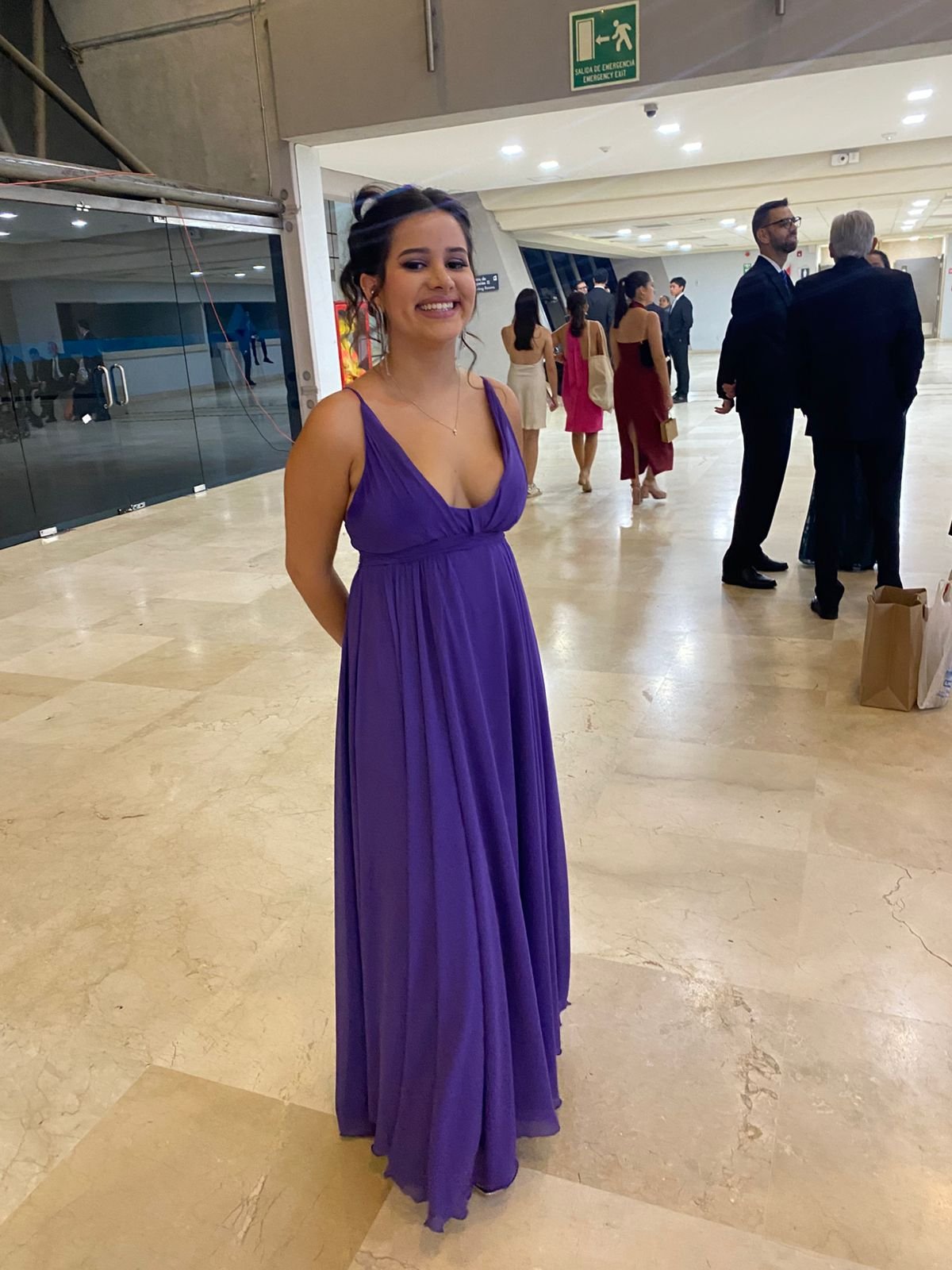Woman wearing a purple formal dress